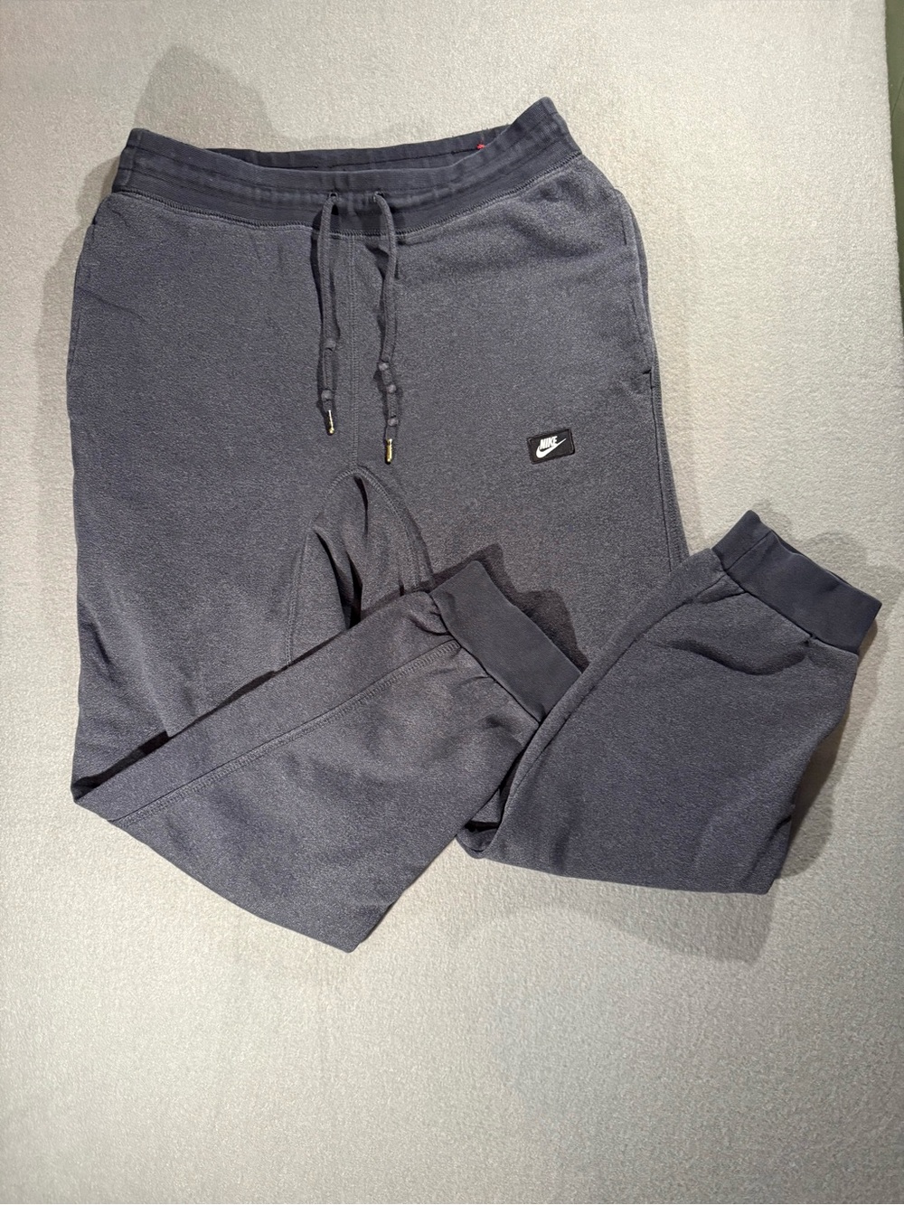 Nike Black Fleece Jogger Pants with Red Logo Tag